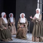 Soraya Mafi (right) as Sister Genoveva, with the Chorus of Opera North